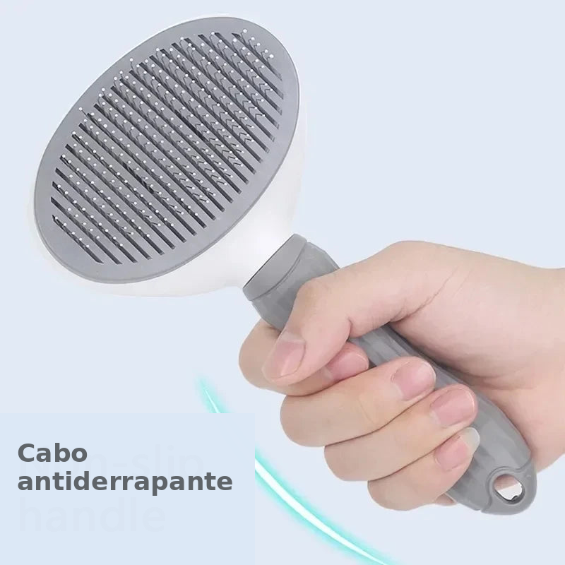 Escova Autolimpante para Cães e Gatos — cabo antiderrapante